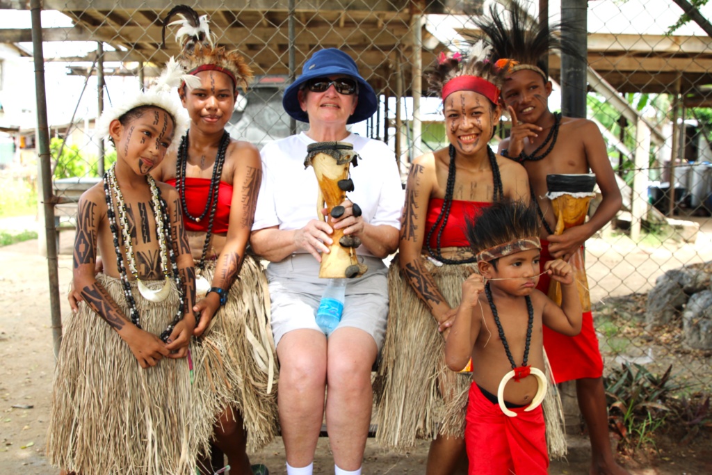 Tourists in Tubuseria Village - Oceania Cruises' Destinations
