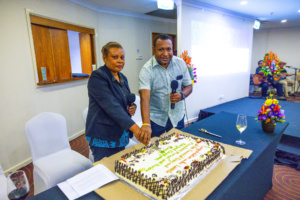 (L-R) TPA’s Senior Accountant, Silvet Eremas with TPA’s Senior Officer for International & Domestic Market, Simon Dari Pih during the cake cutting ceremony following the official launch of the three policies at the Holiday Inn, Port Moresby.