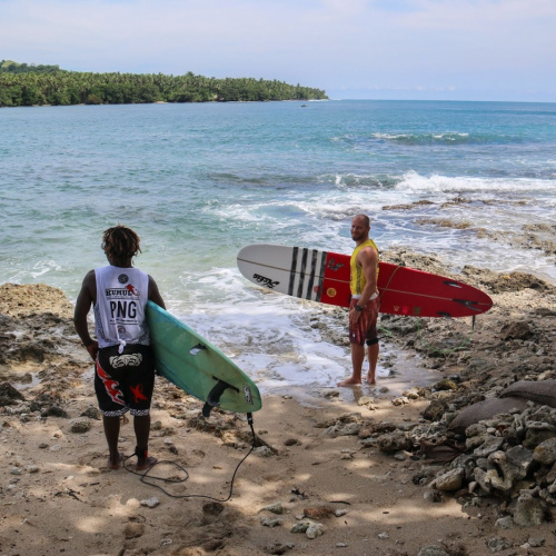 Longboard surfers at Tupira Longboard Surfers At Tupira